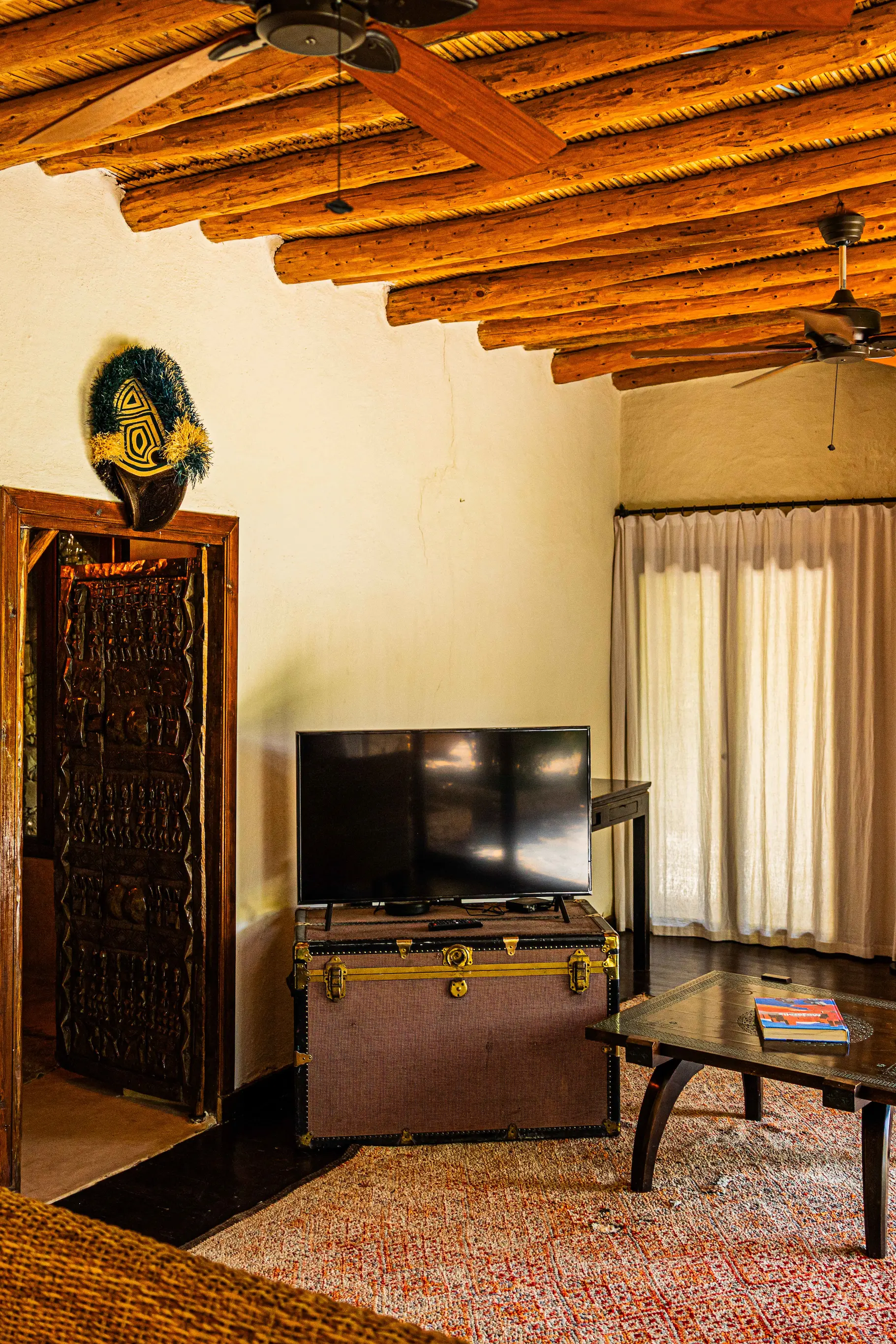 Cozy adults-only couples room equipped with modern TV entertainment near the Agafay desert